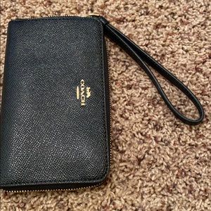 Coach black wristlet. Used 2x. EUC. $38